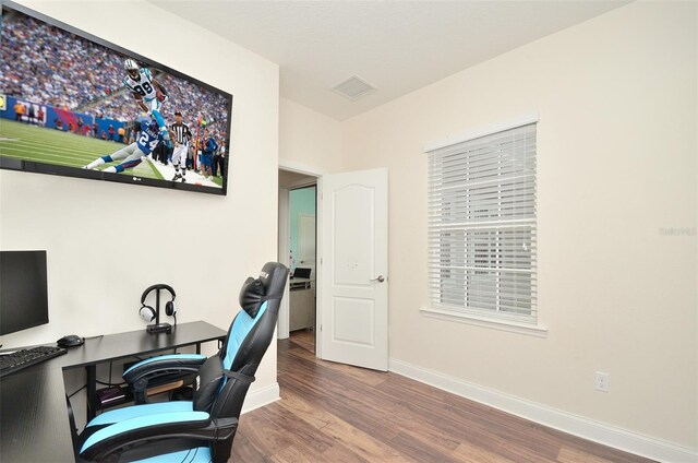 office area with hardwood / wood-style floors