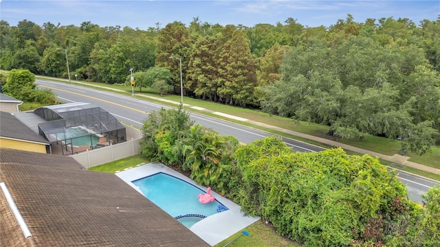 view of pool featuring a lanai