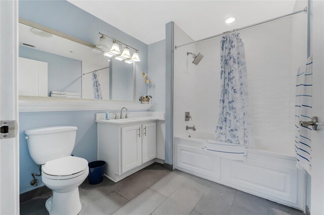 full bathroom with tile patterned flooring, vanity, shower / bathtub combination with curtain, and toilet