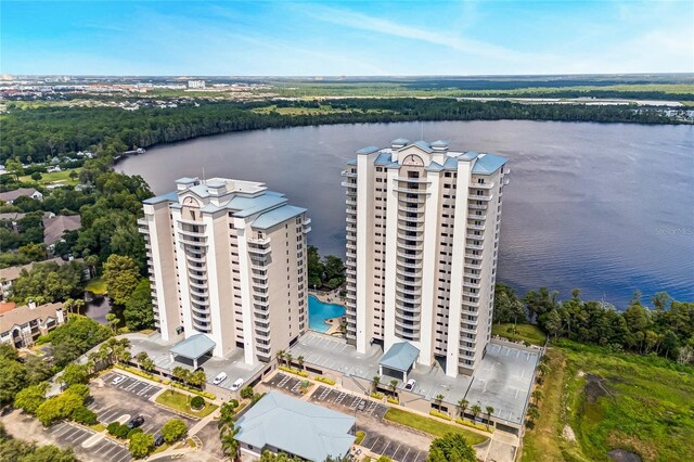 birds eye view of property with a water view