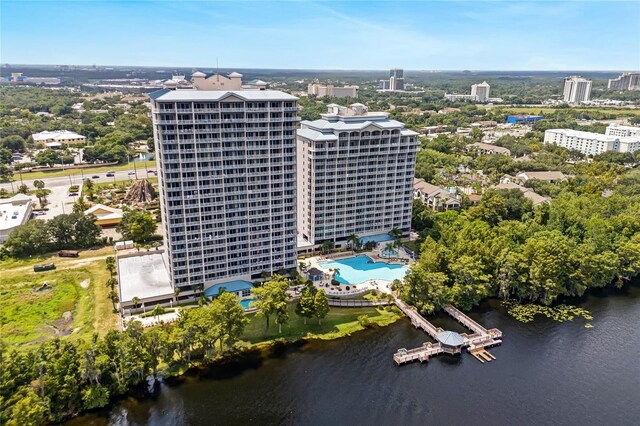 birds eye view of property with a water view