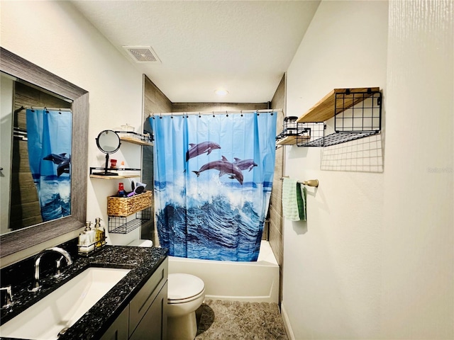 full bathroom with a textured ceiling, shower / bath combo with shower curtain, vanity, and toilet