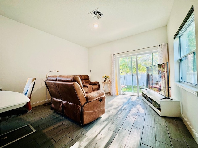 living room featuring a wealth of natural light