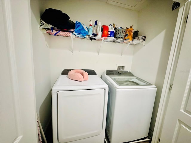 laundry area featuring separate washer and dryer