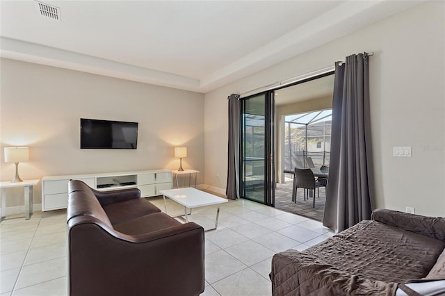 living room with light tile patterned flooring