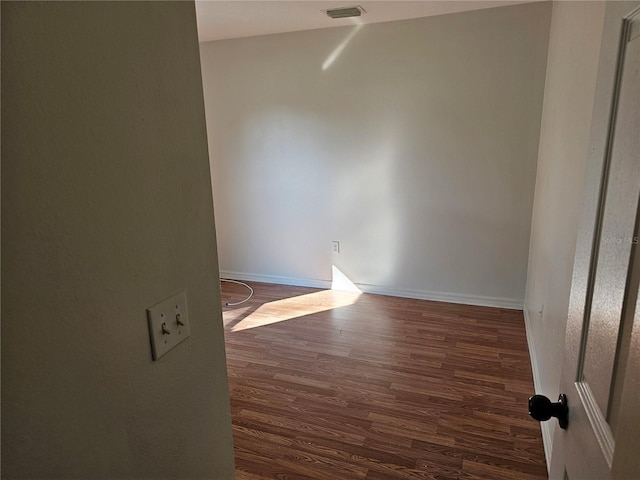 empty room featuring wood-type flooring