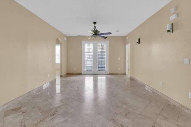 spare room featuring ceiling fan