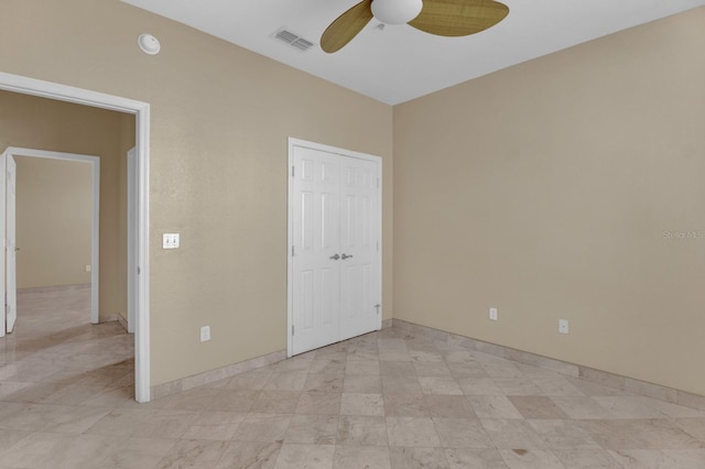 unfurnished bedroom with ceiling fan