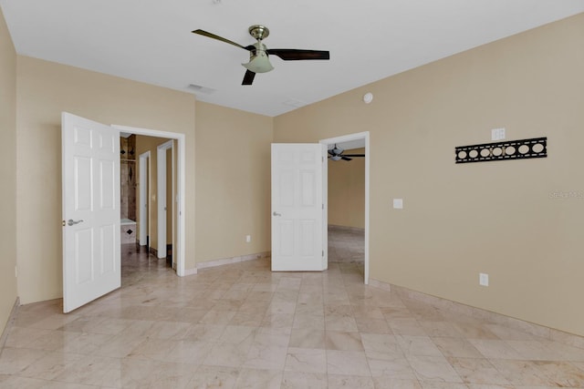 unfurnished bedroom featuring ceiling fan