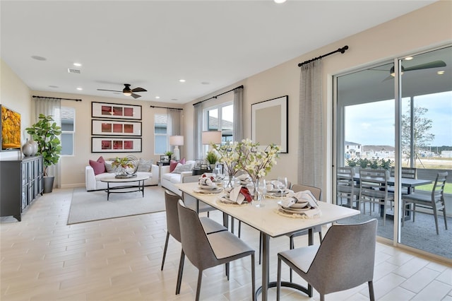 dining area featuring ceiling fan