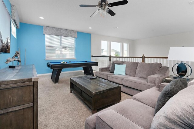 living room featuring ceiling fan, pool table, and light colored carpet