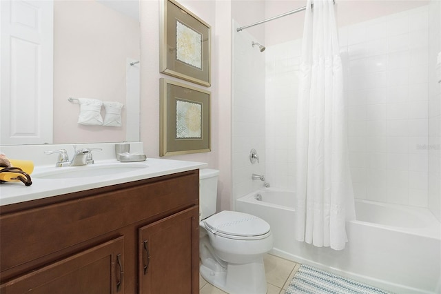 full bath with tile patterned floors, shower / bath combo with shower curtain, toilet, and vanity