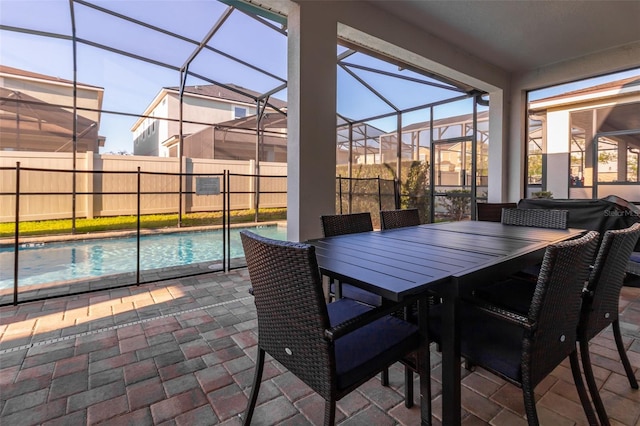 view of patio / terrace featuring a lanai and a fenced in pool