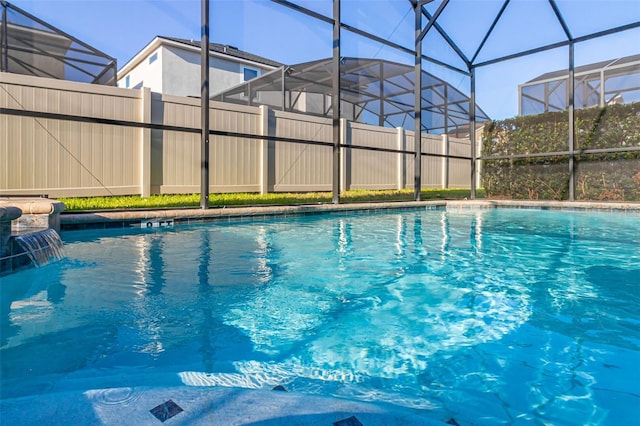 view of pool featuring a lanai