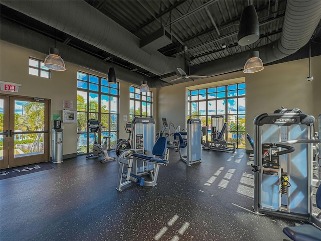 exercise room featuring french doors