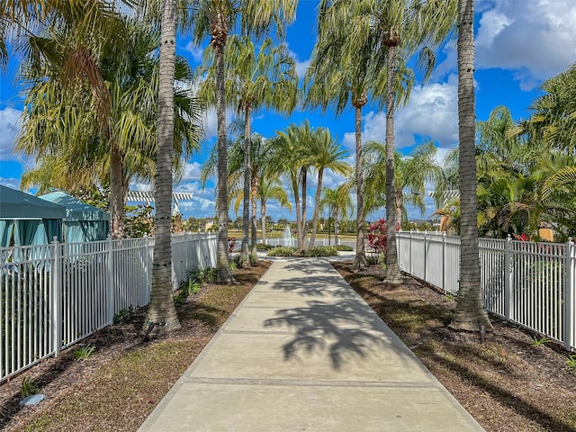 surrounding community featuring fence