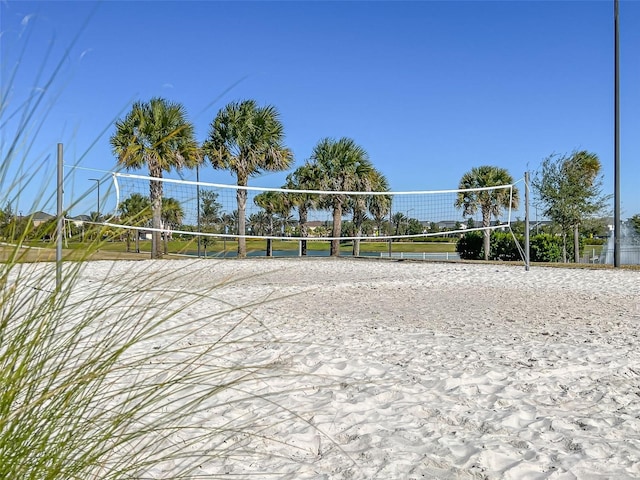 view of home's community featuring volleyball court