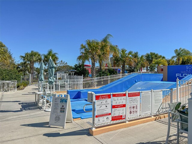 view of home's community featuring a pool