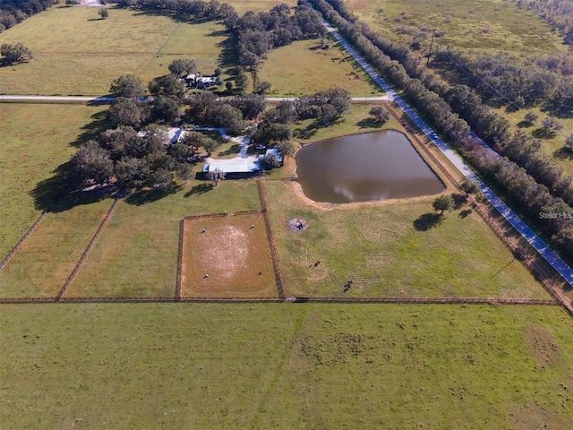 bird's eye view with a rural view and a water view