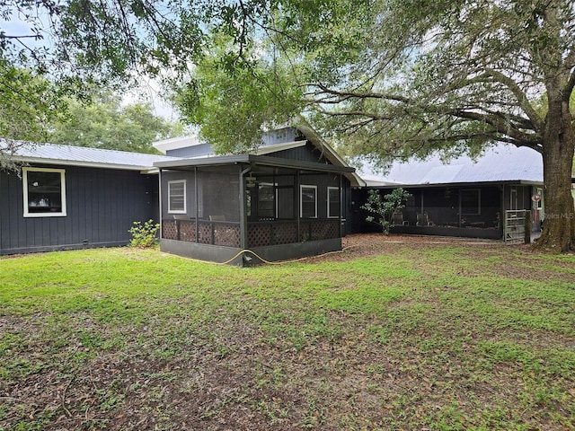 view of yard featuring a sunroom