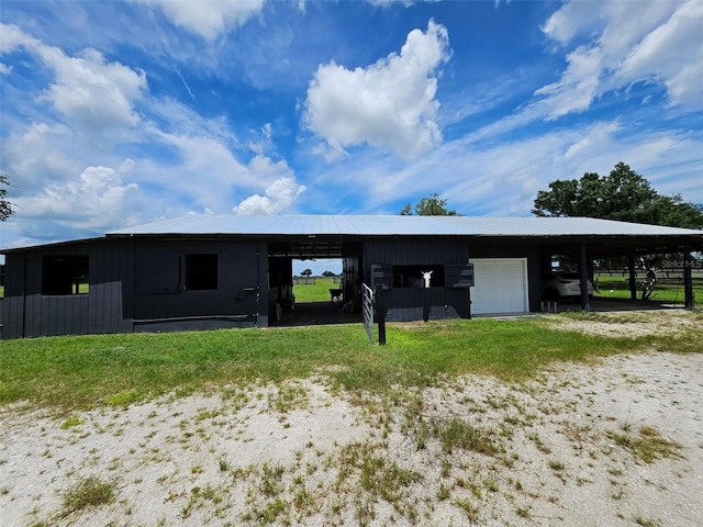 exterior space featuring an outbuilding