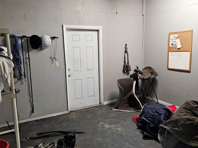 miscellaneous room with concrete flooring