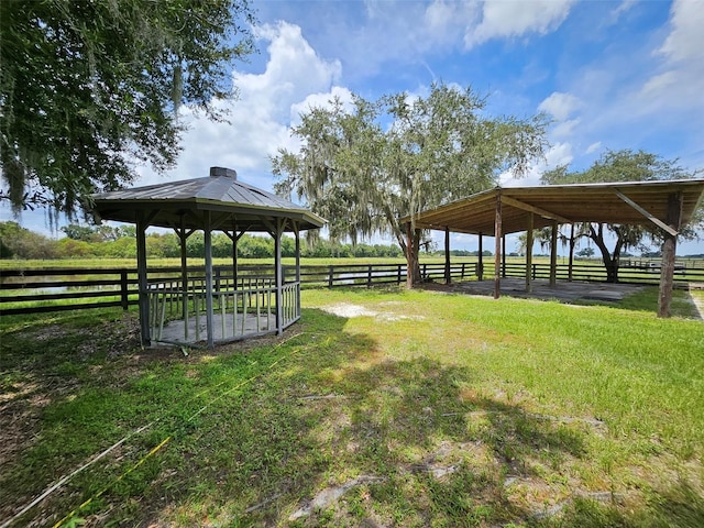 exterior space with a rural view and a gazebo