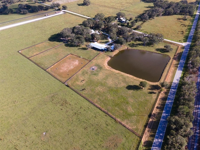 bird's eye view featuring a rural view and a water view