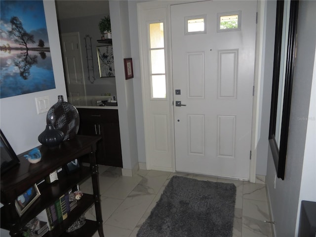 view of tiled entrance foyer