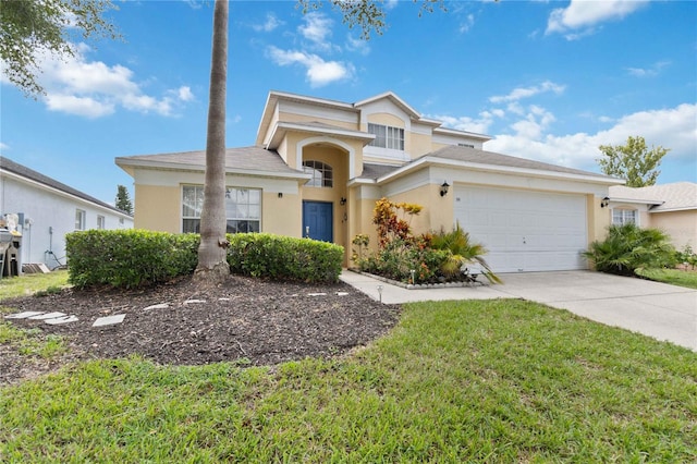 view of front of property with a garage and a front lawn