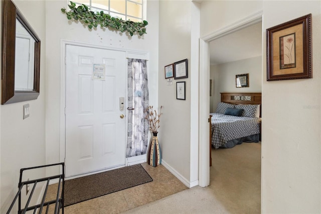 entryway featuring light tile patterned floors