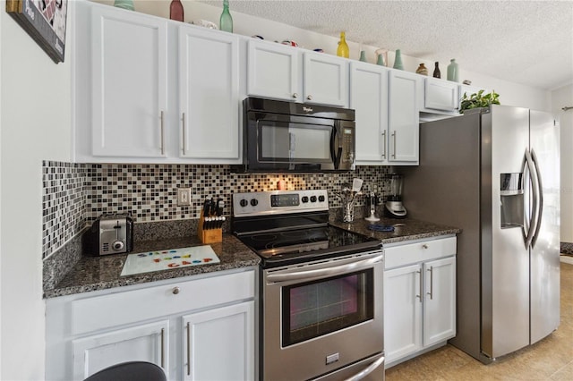 kitchen with stainless steel appliances, decorative backsplash, a textured ceiling, white cabinets, and dark stone countertops