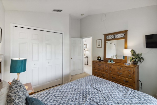241 Grosvenor Loop, Davenport, FL 33897 - bedroom with a closet, vaulted ceiling, and carpet
