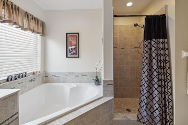 bathroom featuring plus walk in shower