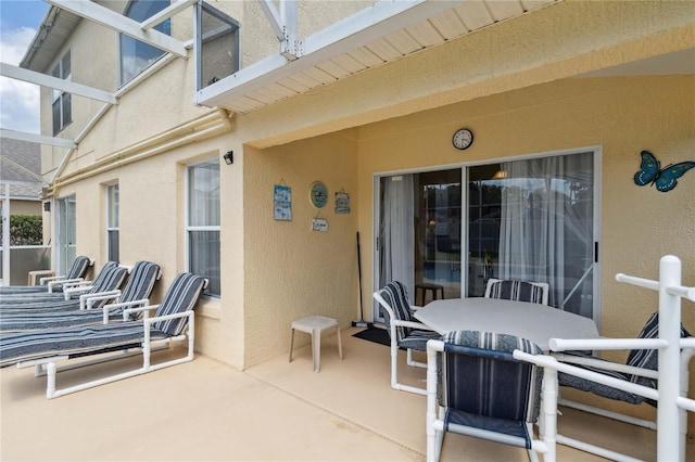 241 Grosvenor Loop, Davenport, FL 33897 - view of patio / terrace with outdoor dining area