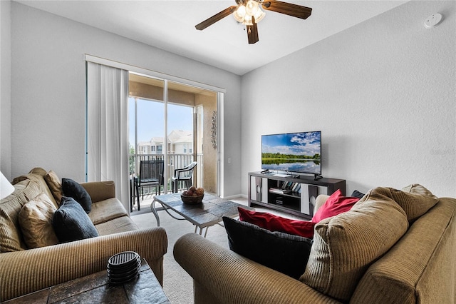 living room featuring ceiling fan