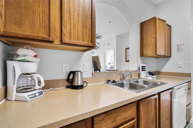 kitchen with sink and dishwasher