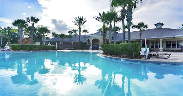 view of swimming pool featuring a patio area