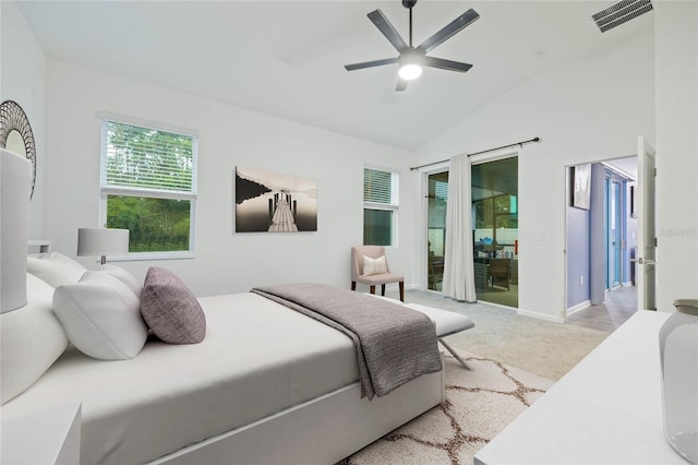 bedroom with a ceiling fan, visible vents, vaulted ceiling, access to outside, and light colored carpet