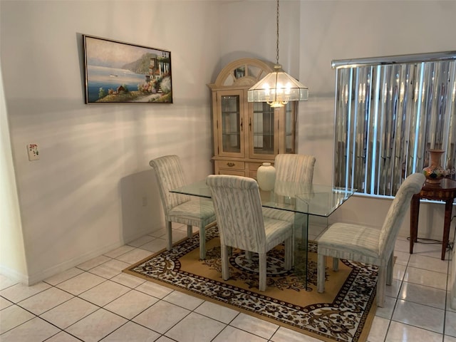 dining area featuring light tile patterned floors