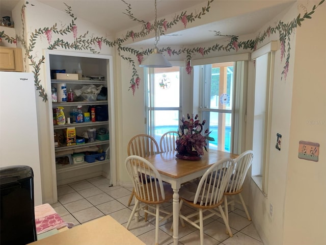 dining room with light tile patterned floors