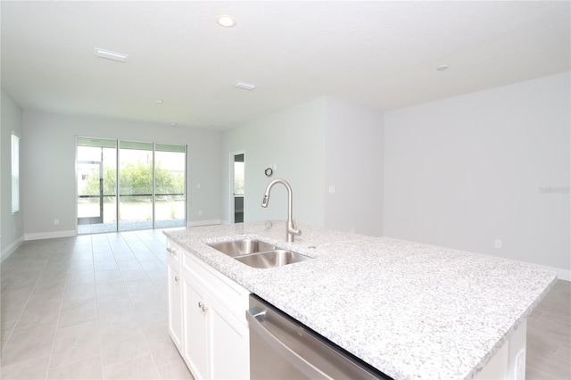 kitchen featuring light stone countertops, dishwasher, a kitchen island with sink, sink, and white cabinets