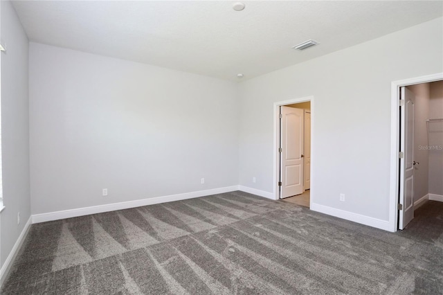 unfurnished bedroom with carpet flooring