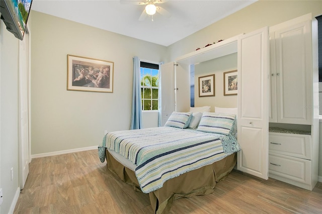 bedroom featuring ceiling fan and light hardwood / wood-style floors