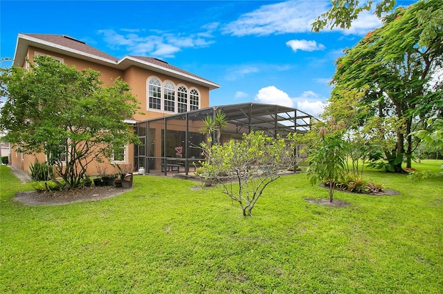 view of yard featuring a lanai