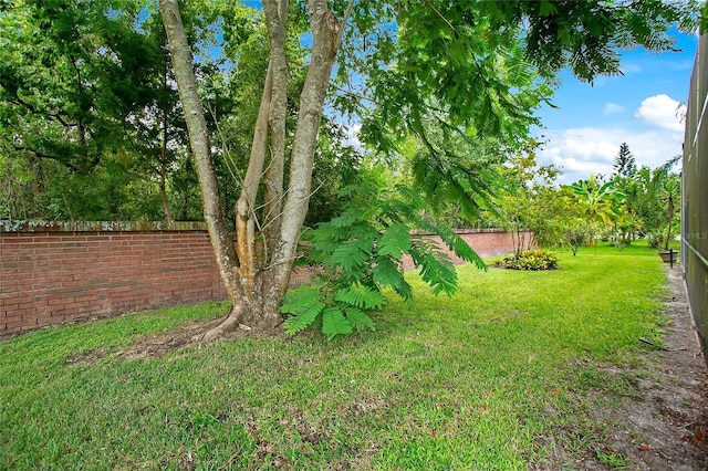 view of yard featuring fence