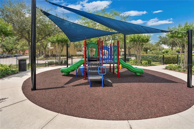 community jungle gym with fence