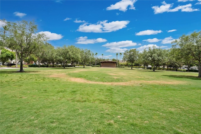 view of home's community featuring a lawn