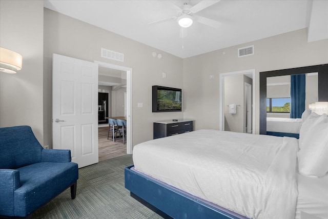 bedroom featuring ceiling fan and hardwood / wood-style floors