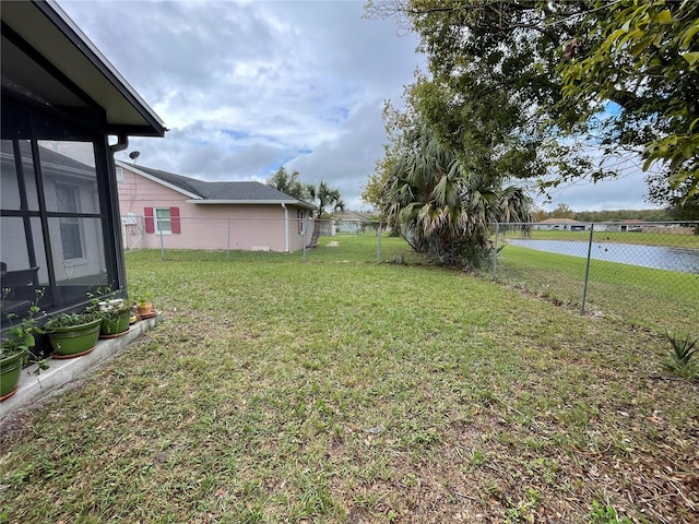 view of yard featuring a water view